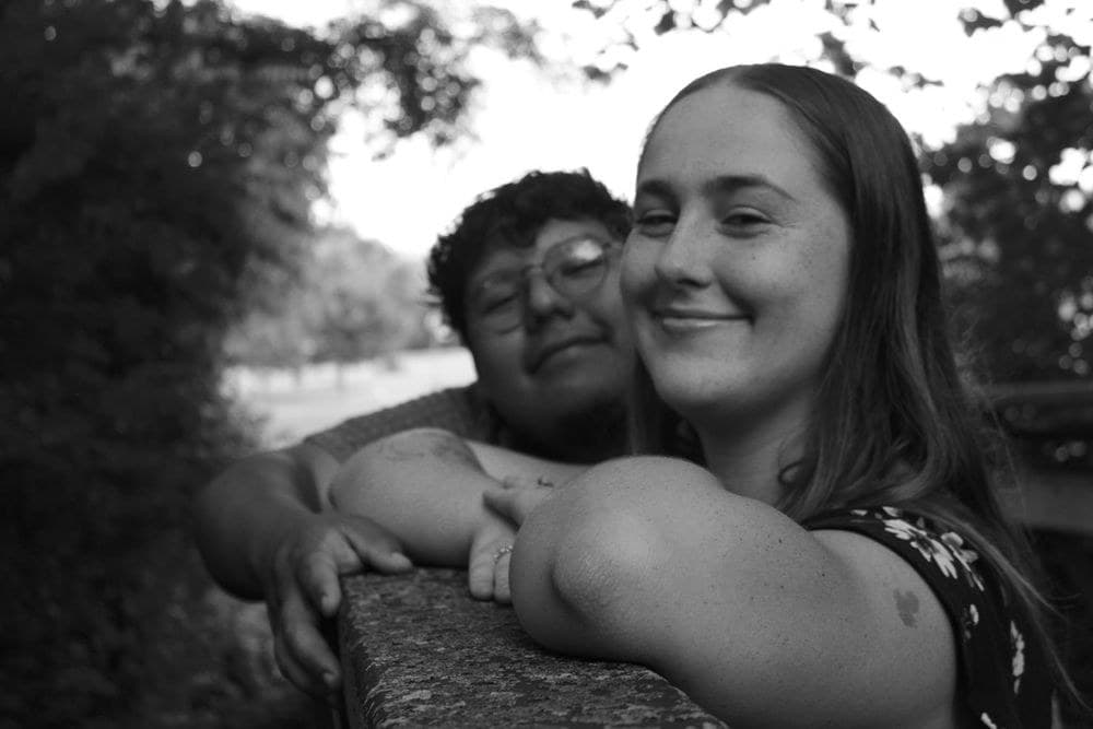Couple embracing in soft light, in black and white